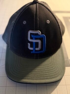 Pacifica Black Trucker Cap with Blue and White Embroidered Accent